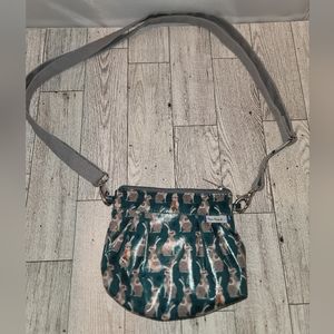 Papa Pique et Maman Coud purse.